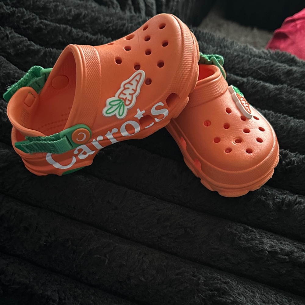 CARROT CROCS Kids Orange and Green. Size 10. Slightly worn